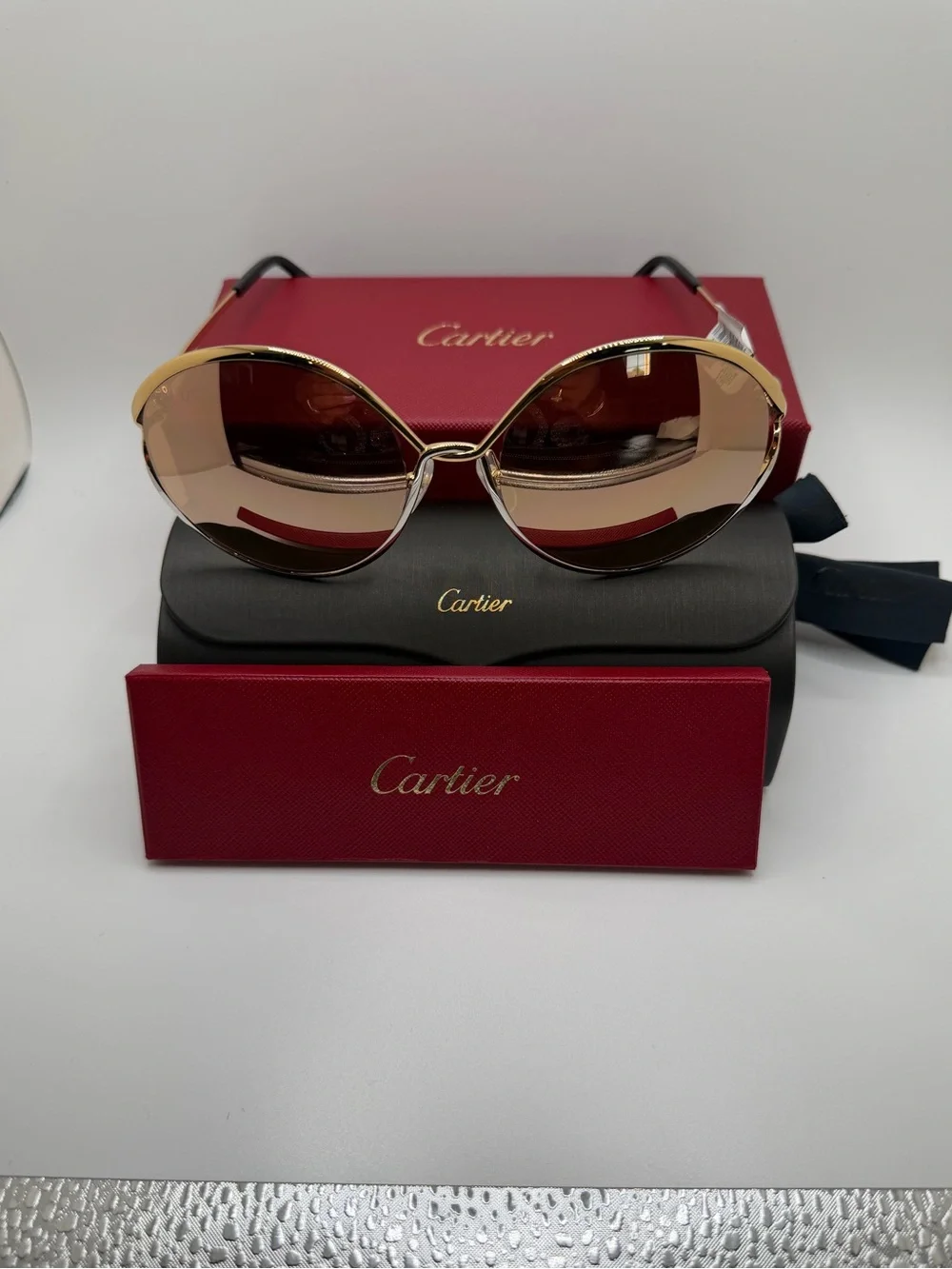 Cartier Gold Frame Sunglasses with Reflective Tinted Lenses